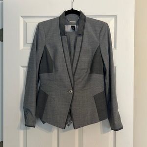 Grey smart tailored suit and pants.